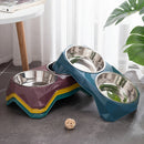 Comedouro duplo para cães e gatos com tigelas de aço inoxidável, base antiderrapante e design moderno com acabamento diamantado.